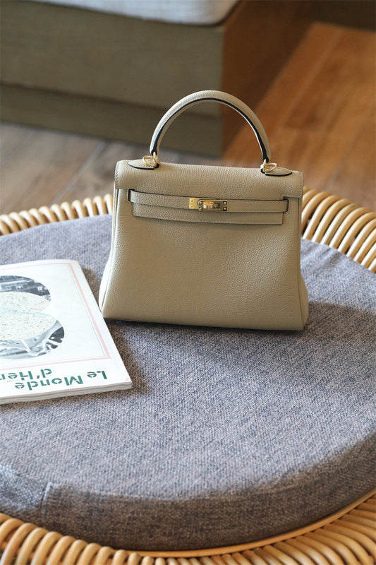 Side view of streamlined structured handbag