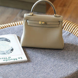 Side view of streamlined structured handbag