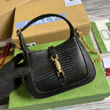 Handle and strap detail of structured modern women's handbag – women's luxury accessory