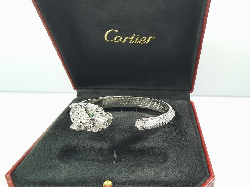 Angled view of Cartier unisex jewelry piece