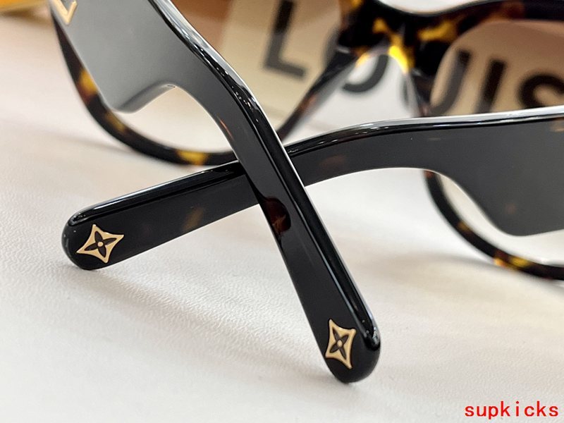 Close-up detail view of Louis Vuitton unisex sunglasses