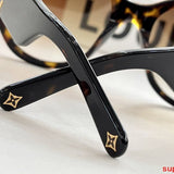 Close-up detail view of Louis Vuitton unisex sunglasses