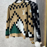 Close-up detail shot of Louis Vuitton luxury clothing with logo-detail design