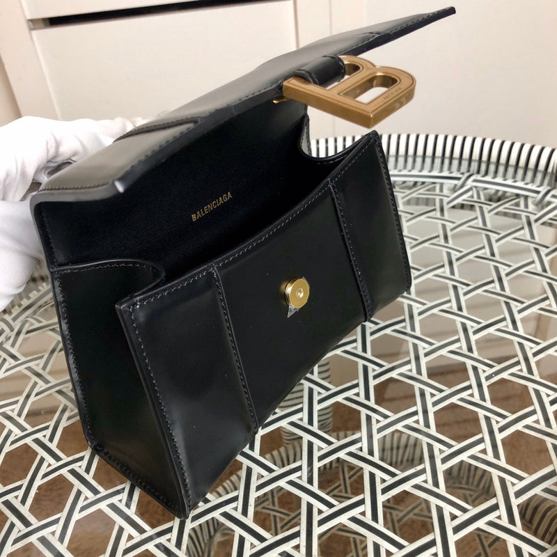 Front view of chic sleek women's handbag – women's luxury accessory