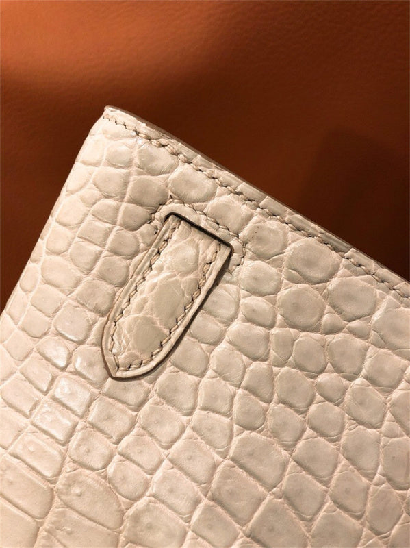 Side view of poised structured handbag