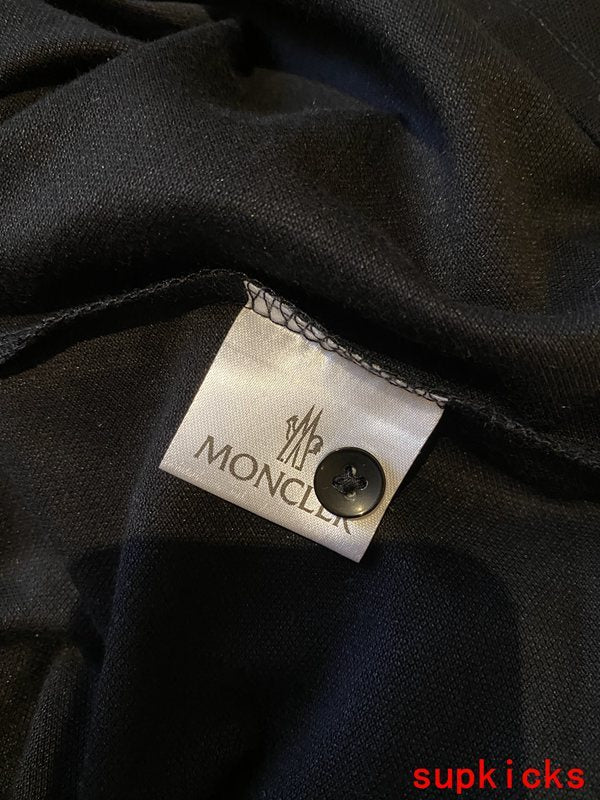 Side profile of Moncler luxury clothing with tailored silhouette