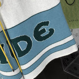 Flat lay presentation of Rhude luxury clothing with relaxed-fit cut