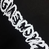 Flat lay presentation of Givenchy luxury clothing with monogram-inspired silhouette