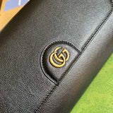 Styled lifestyle shot of polished statement women's handbag – women's premium purse