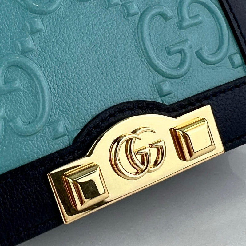 Back view of statement modern women's handbag – women's luxury accessory