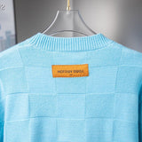 Close-up detail shot of Louis Vuitton luxury clothing with tailored silhouette