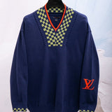 Close-up detail shot of Louis Vuitton luxury clothing with streetwear-inspired cut