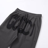 Close-up detail shot of Gucci luxury clothing with monogram-inspired silhouette
