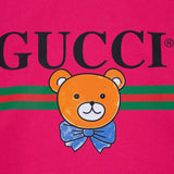Flat lay presentation of Gucci luxury clothing with everyday silhouette