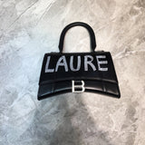 Sleek Faux Leather Handbag - Statement Silhouette | Women's Premium Handbag #630 - side angle view (image 2) of designer-inspired handbag