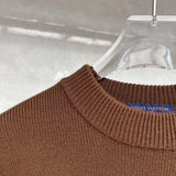 Close-up detail shot of Louis Vuitton luxury clothing with tailored silhouette