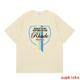 Side profile of Rhude luxury clothing with signature branding