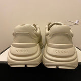 Gucci soft grey luxury sneakers view 5 bold athletic profile