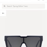 Close-up detail view of Louis Vuitton unisex sunglasses