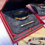 Close-up detail view of Cartier unisex jewelry piece