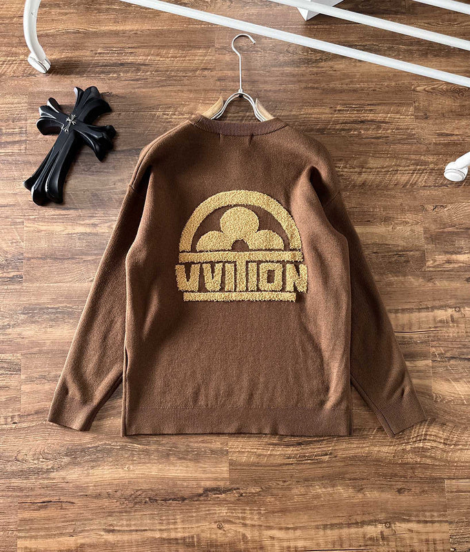 Close-up detail shot of Louis Vuitton luxury clothing with logo-detail design