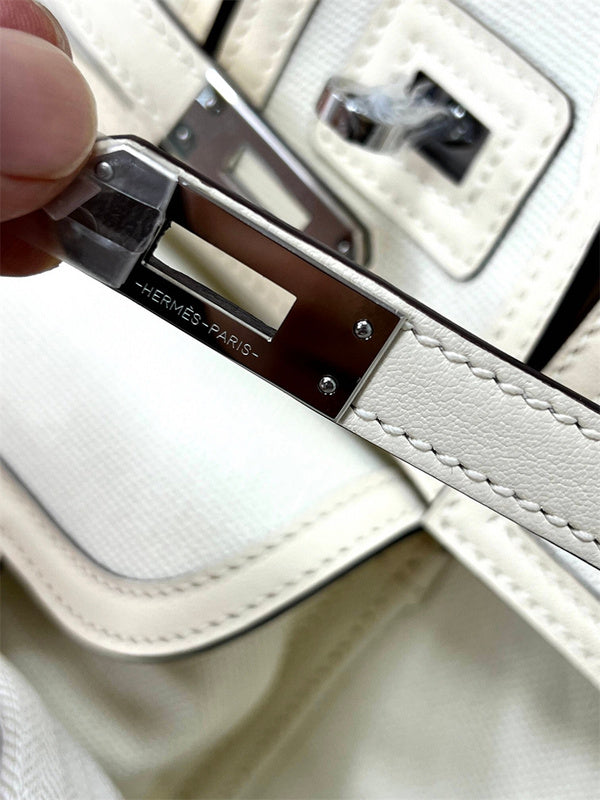 Side view of fluid structured handbag