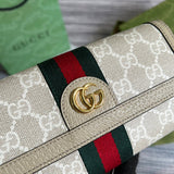 Styled lifestyle shot of refined signature women's handbag – women's luxury handbag