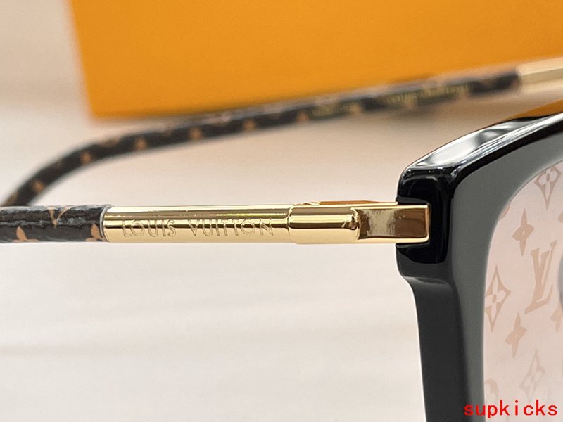 Close-up detail view of Louis Vuitton unisex sunglasses