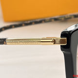 Close-up detail view of Louis Vuitton unisex sunglasses