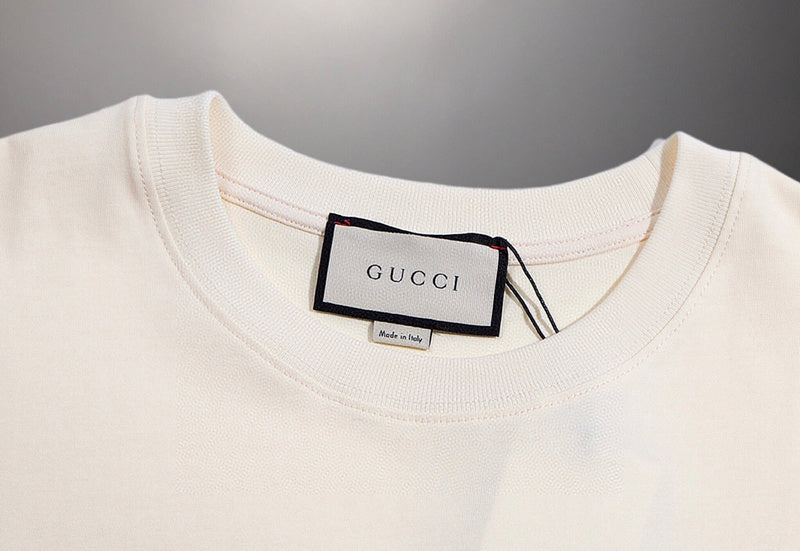 Full styled look of Gucci luxury clothing with signature branding