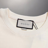 Full styled look of Gucci luxury clothing with signature branding