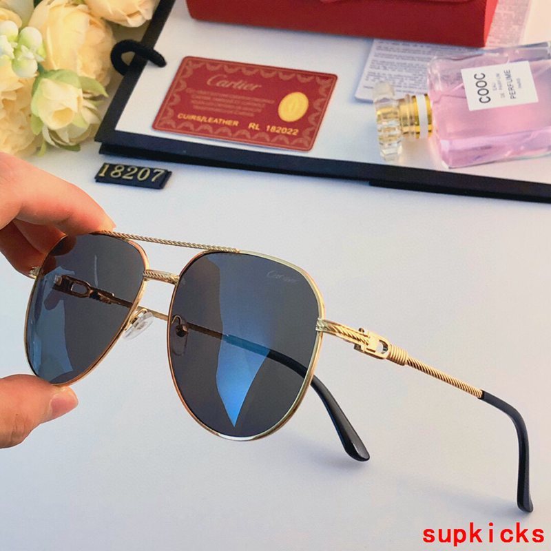 Angled view of Cartier unisex sunglasses