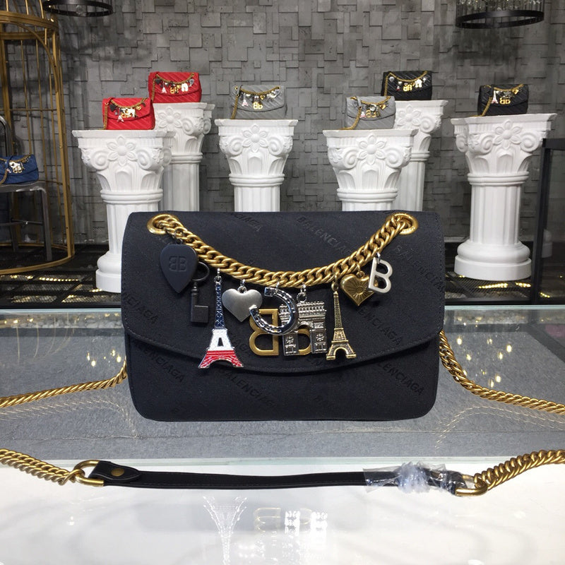 Effortless Premium PU Leather Handbag - Signature Hardware Accents | Women's Luxury Handbag #831 - side angle view (image 2) of designer-inspired handbag