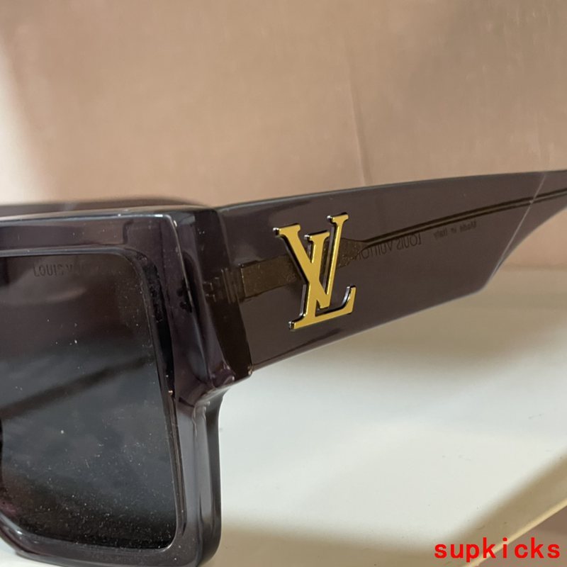 Close-up detail view of Louis Vuitton unisex sunglasses