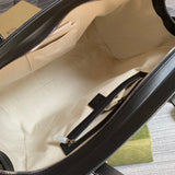 Side profile of polished statement women's handbag – women's designer-style accessory