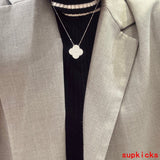 Front view of Van Cleef & Arpels unisex jewelry piece