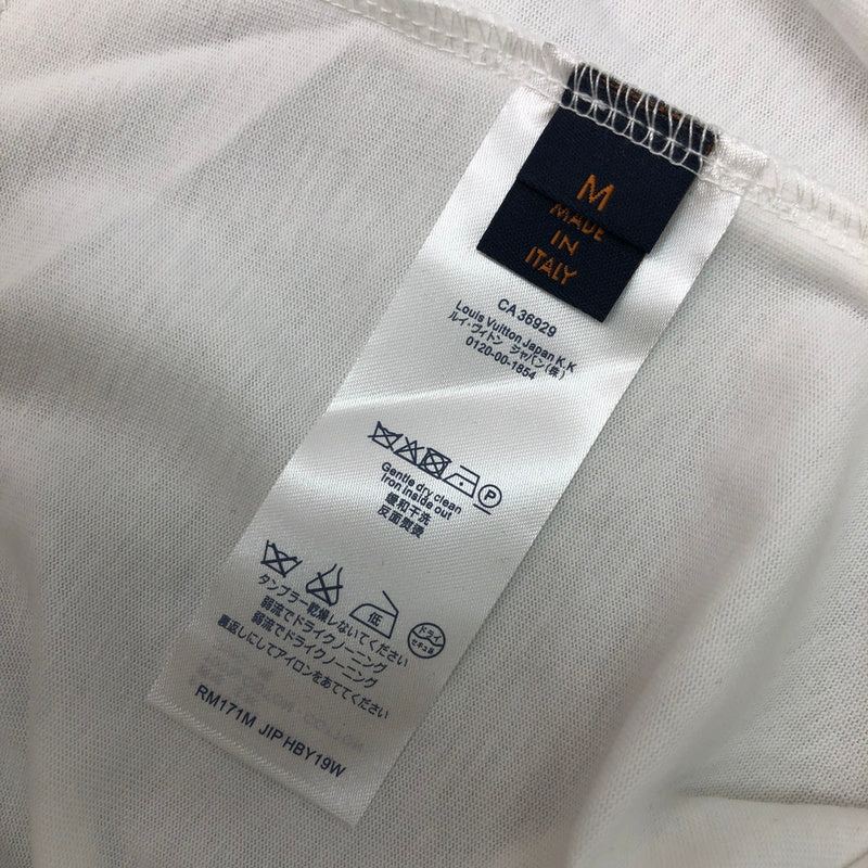 Flat lay presentation of Louis Vuitton cotton t-shirt with monogram-inspired silhouette