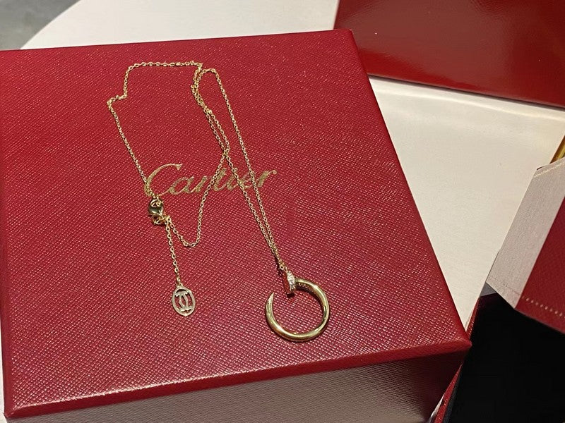 Angled view of Cartier unisex jewelry piece