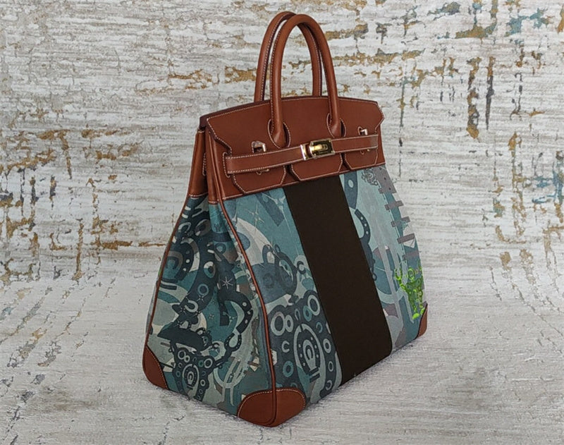  Signature handbag carried on shoulder