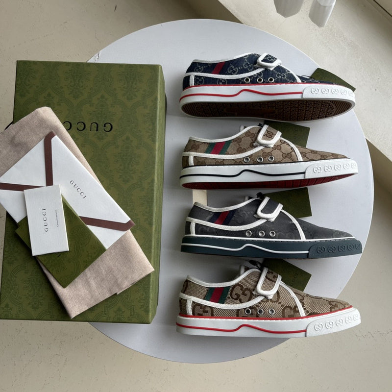 Side profile of Gucci soft grey sneakers classic court silhouette