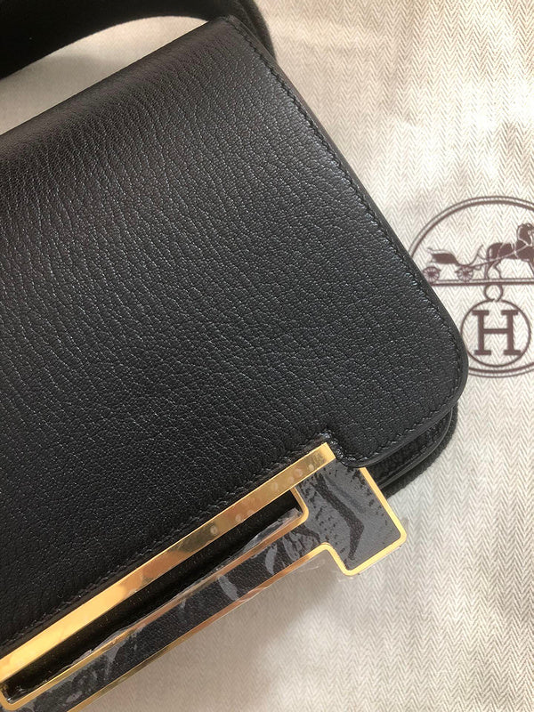 Side view of sculpted structured handbag