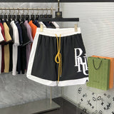 Back view of Rhude luxury clothing with label-forward styling