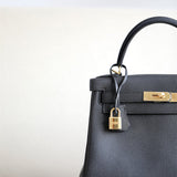 Close-up detail of understated bag design