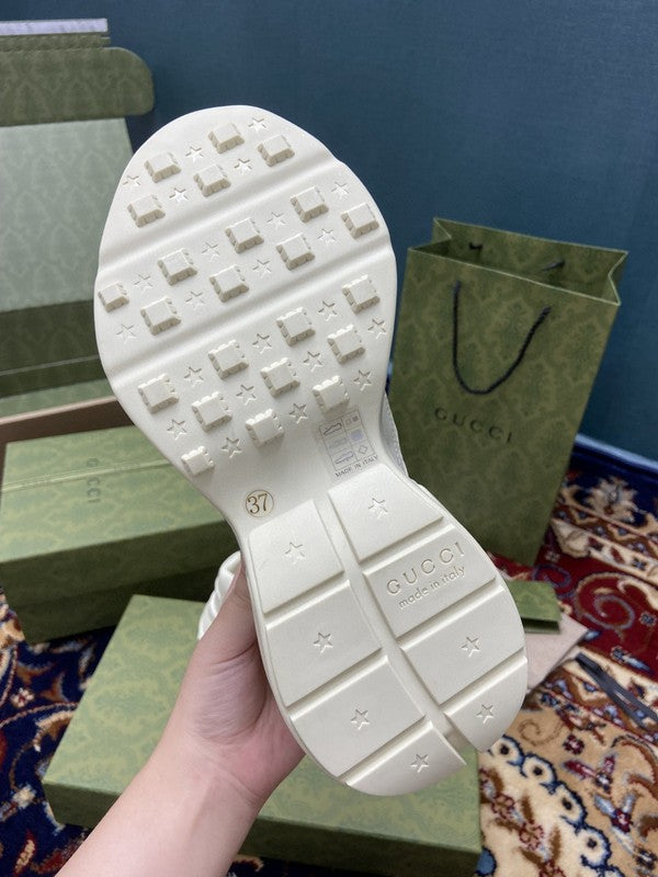 Gucci clean off-white luxury sneakers view 4 bold athletic profile