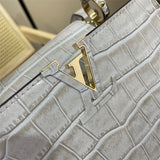  Streamlined crossbody bag carried on shoulder 10