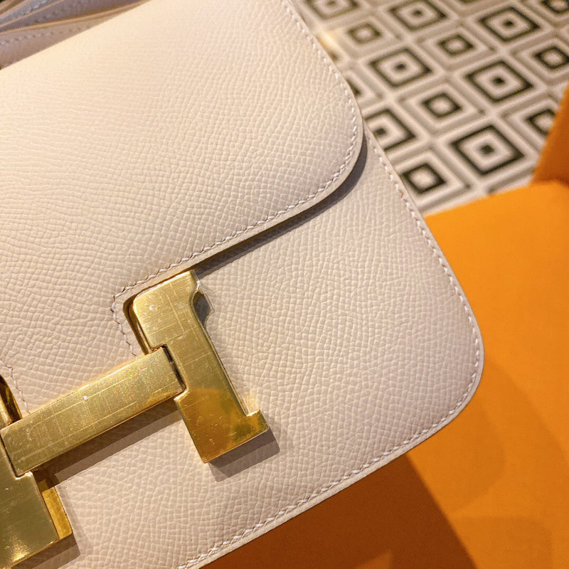 Side view of refined structured handbag