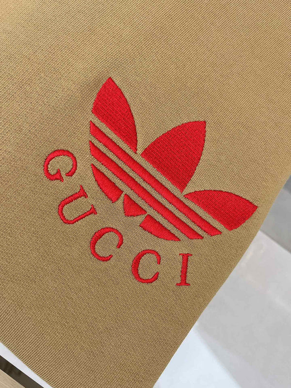 Front view of Gucci luxury clothing with monogram-inspired silhouette