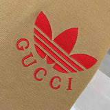 Front view of Gucci luxury clothing with monogram-inspired silhouette