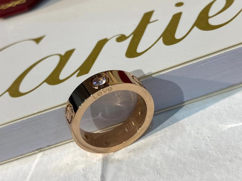 Side view of Cartier unisex jewelry piece