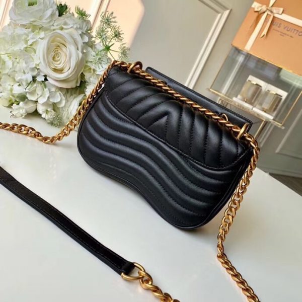 Close-up detail of signature chic women's handbag – women's luxury accessory